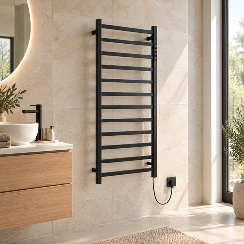 Badheizkörper GRANADA elektrisch in Schwarz, 50 x 120 cm im Bad neben dem Waschtisch